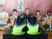 Front view highlighting the black laces and neon green toe area