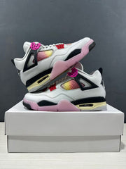 Stacked display of the sneakers showing the side profile, pink outsole, and black structural accents.
