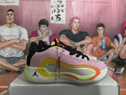 Side view of a pink Jordan basketball shoe with black laces, layered side detailing, lime-green and orange accents, and a visible Jumpman logo.