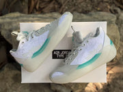 Side and three-quarter view of the pair displayed on a box labeled AIR JORDAN TYPE 39.