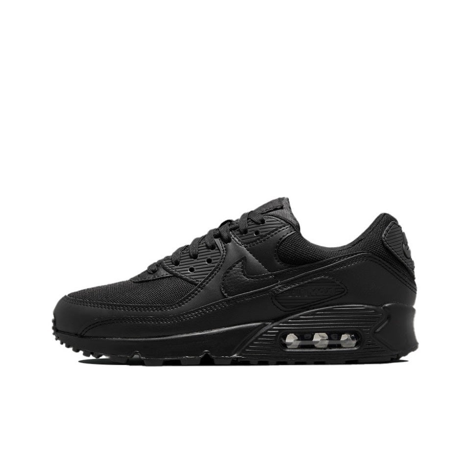 Side view of a black Nike Air Max 90 sneaker with a visible heel Air unit.