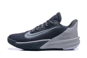 Side view of a Nike Precision 7 basketball shoe showing its gray heel and patterned outsole.