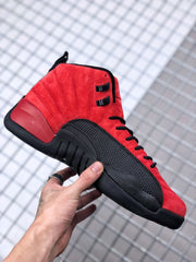 Side profile highlighting the red upper, black textured side panel, and black sole.