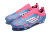 Pair of pink and blue laceless F50 soccer cleats shown from a front-side angle.