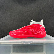 Side profile of a red sneaker with a white collar and raised layered detailing across the upper.