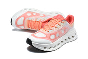 Pair of white and coral On Cloudtilt Remx sneakers shown from above and at an angle.