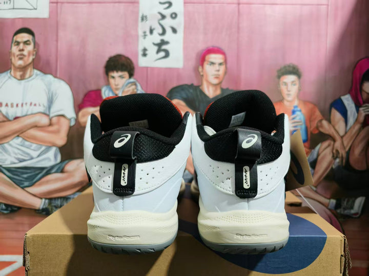 Rear view of white ASICS basketball shoes with black collars and heel straps
