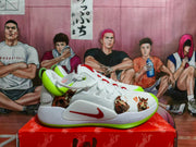 Side view of a white Nike Zoom basketball shoe with fluorescent green trim, red branding, and illustrated character graphics.