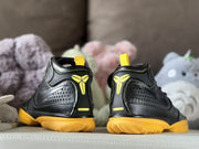 Rear view showing the Kobe logo details and yellow heel accents.