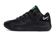 Side view of black Nike KD 18 basketball shoe with green and white accents