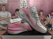 Side view of the grey and pink shoes with patterned panels