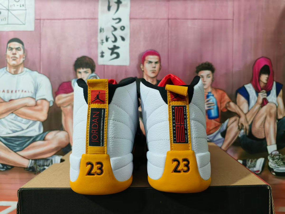Rear view of white, black, and yellow Jordan high-top sneakers showing Jordan heel tabs and number 23