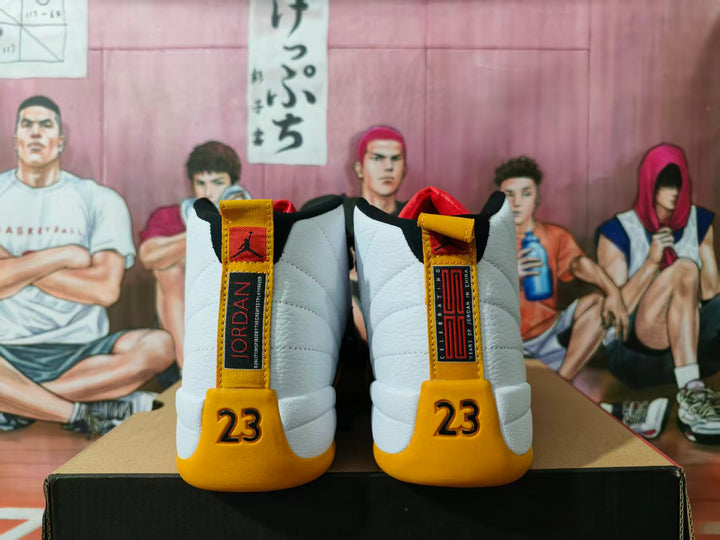 Rear view of white, black, and yellow Jordan high-top sneakers showing Jordan heel tabs and number 23