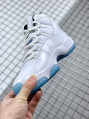 Close-up of the sneaker's white side panels, laces, and translucent blue outsole.