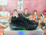 Side view of a black Nike GT basketball sneaker showing the lace-up upper, textured side panel, Nike swoosh, and outsole.