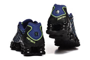 Rear view of Nike Shox TL sneakers showing the heel design and sculpted soles.