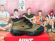 Side view of a brown and black Nike mid-top sneaker with a gold-outlined Swoosh and sculpted outsole.
