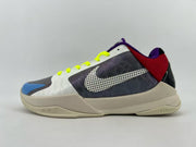 Side profile of the shoe with multicolor panels and beige-colored sole
