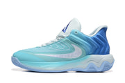 Side profile showing the layered aqua upper and sculpted sole