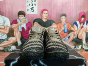 Front view of the brown and black patterned Nike basketball shoes.