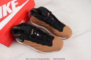 Pair of brown and black Nike Total Air Foamposite Max sneakers shown with a red shoebox