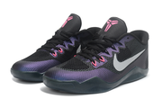Pair of black, purple, and pink Kobe 11 shoes viewed from the front