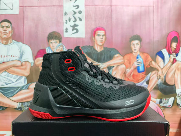 Side view of a black high-top basketball sneaker with red outsole accents and SC toe detailing.