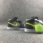 Rear three-quarter view of the pair with the fluorescent lace set attached to one shoe.