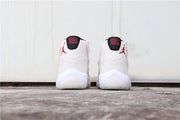 Rear view of the pair showing black heel tabs and red branding.