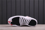 Outsole view showing black traction sections and white grooves with red heel accents.