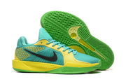 Teal and yellow Nike Sabrina 2 basketball shoes with green outsole