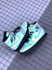 Pair of sneakers showing iridescent color-shifting panels against a gridded background.