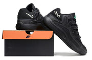 Black Nike KD 18 sneakers arranged with a shoebox.