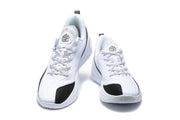 Front-facing view of the pair showing black toe panels, patterned uppers, and padded collars.