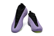 Pair of purple and black basketball shoes shown from above at an angle.