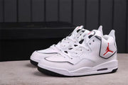 Pair of white Jordan 23 low-top sneakers with black trim and red heel branding