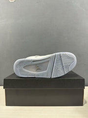 Outsole view of the grey Jordan Air Jordan 4 sneaker showing the herringbone-style tread pattern and Jordan branding.