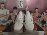 Duplicate front view showing the white toe boxes, red accents, and Nike branding.