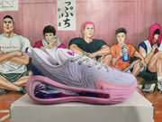 Side view of a lavender sneaker with a pink sole and decorative multicolor panel