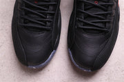 Close-up of the black toe boxes and lace areas.