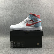 Jordan Air Jordan 1 Mid sneaker displayed on a shoe box; the box label visibly shows EU 41.