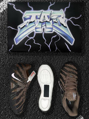 Top and side views of the patterned Nike sneakers with brown laces and pink Swoosh branding.