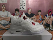 Side view of a white high-top sneaker with red accents, mesh paneling, and a visible midsole air window