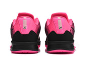 Heel view of the pink and black basketball shoes with a visible 20 marking