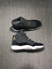 Pair of black high-top sneakers shown in side and top views, highlighting the white midsoles and translucent outsoles.