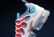 Side close-up showing sculpted white supports, a black Swoosh, and the clear-looking sole