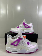 Close angled view highlighting the white upper, violet side supports, mesh panels, and outsole accents.