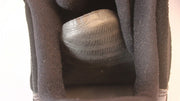 Close-up view of the black padded tongue and lace area.