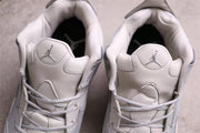 Top view showing the padded tongues, collars, and metallic tongue logos.