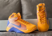 Front and angled views showing the laces and Kobe tongue logo